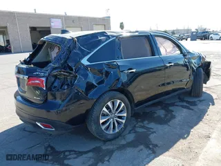 2016 Acura MDX w/Tech/Entertainment with VIN 5FRYD4H64GB045671, listed as a IAAI auction lot 41888947 with 71,084 mi miles. Bid and sale history available at carsss.com. Image 4.