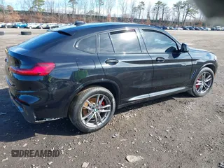 2021 BMW X4 M40i with VIN 5UX2V5C03M9H54824, listed as a IAAI auction lot 41817714 with 34,880 mi miles. Bid and sale history available at carsss.com. Image 4.