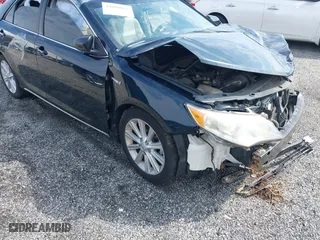 2013 Toyota Camry Hybrid LE with VIN 4T1BD1FK5DU076612, listed as a IAAI auction lot 42000025 with 210,000 mi miles. Bid and sale history available at carsss.com. Image 18.