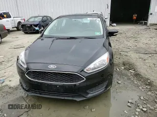 2016 Ford Focus SE с VIN 1FADP3F21GL334852, выставлен на аукционе Copart как лот 53902945 с пробегом 121 909 миль миль и Списание • Salvage title. История ставок и продаж доступна на DreamBid. Изображение 13.
