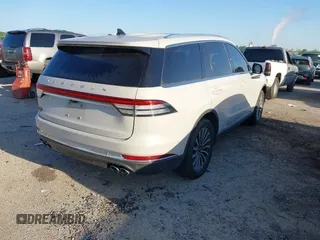 2021 Lincoln Aviator Reserve with VIN 5LM5J7XC5MGL02577, listed as a IAAI auction lot 41944356 with 68,941 mi miles and . Bid and sale history available at DreamBid. Image 4.