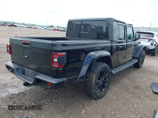 2023 Jeep Gladiator Overland with VIN 1C6HJTFG6PL555153, listed as a IAAI auction lot 42210878 with 40,576 mi miles and . Bid and sale history available at DreamBid. Image 4.