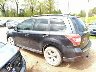 2014 Subaru Forester 2.5i Premium with VIN JF2SJAEC1EH477920, listed as a IAAI auction lot 41974390 with 145,837 mi miles. Bid and sale history available at carsss.com. Image 14.