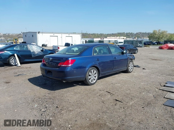 2005 Toyota Avalon XL with VIN 4T1BK36B55U054645, listed as a IAAI auction lot 42069828 with 184,789 mi miles and . Bid and sale history available at carsss.com. Image 4.