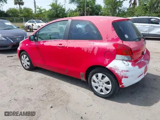 2009 Toyota Yaris with VIN JTDJT903295224512, listed as a IAAI auction lot 42088967 with 165,918 mi miles. Bid and sale history available at carsss.com. Image 3.