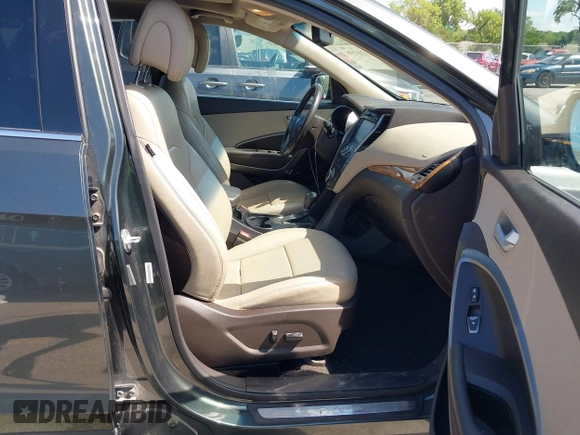 2014 Hyundai Santa Fe with VIN 5XYZUDLB0EG187984, listed as a IAAI auction lot 42607599 with 111,594 mi miles and . Bid and sale history available at DreamBid. Image 5.