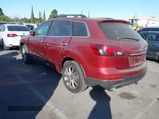 2014 Mazda CX-9 Grand Touring with VIN JM3TB3DV6E0435389, listed as a IAAI auction lot 41406200 with 181,598 mi miles and . Bid and sale history available at DreamBid. Image 3.