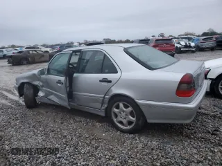 1999 Mercedes-Benz C 230/260/280/320 with VIN WDBHA24G1XA756393, listed as a Copart auction lot 80227694 with 123,520 mi miles and Salvage Title. Bid and sale history available at carsss.com. Image 2.