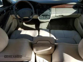 2002 Cadillac DeVille DHS z VIN 1G6KE54Y62U248629, wystawiony jako Copart lot #79825284 z przebiegiem 99 568 mil mil oraz Szkoda całkowita • Salvage title. Historia ofert i sprzedaży dostępna na DreamBid. Obrazek 8.