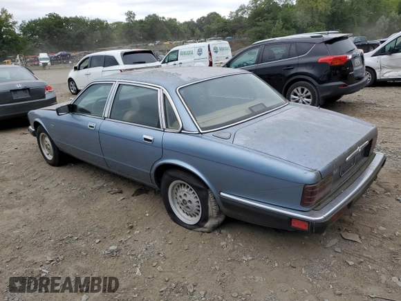 1989 Jaguar XJ with VIN SAJHY1540KC578115, listed as a Copart auction lot 69142274 with Not Provided miles and Clean Title. Bid and sale history available at DreamBid. Image 2.