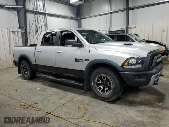 2017 Ram 1500 Rebel with VIN 1C6RR7YT4HS522710, listed as a Copart auction lot 51519335 with 208,742 mi miles and Salvage title. Bid and sale history available at DreamBid. Image 4.