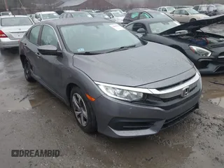 2017 Honda Civic LX z VIN 2HGFC2F57HH552085, wystawiony jako IAAI lot #41889838 z przebiegiem 47 859 mil mil oraz . Historia ofert i sprzedaży dostępna na DreamBid. Obrazek 1.