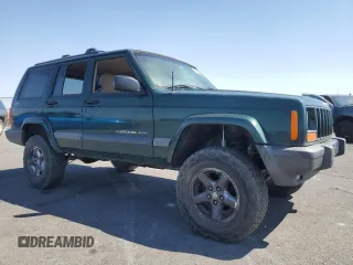 2001 Jeep Cherokee Sport with VIN 1J4FF48S91L610463, listed as a Copart auction lot 59601495 with Not provided miles and Salvage title. Bid and sale history available at DreamBid. Image 4.