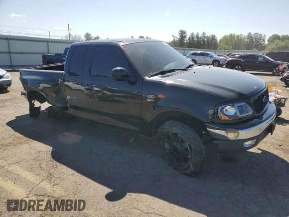1999 Ford F-150 XL с VIN 2FTRX08L4XCA00426, выставлен на аукционе Copart как лот 68354464 с пробегом 157 539 миль миль и Списание • Salvage title. История ставок и продаж доступна на DreamBid. Изображение 4.