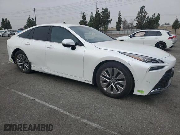 2023 Toyota Mirai XLE with VIN JTDAAAAA8PA009516, listed as a Copart auction lot 62543395 with 27,867 mi miles and Salvage title. Bid and sale history available at DreamBid. Image 4.