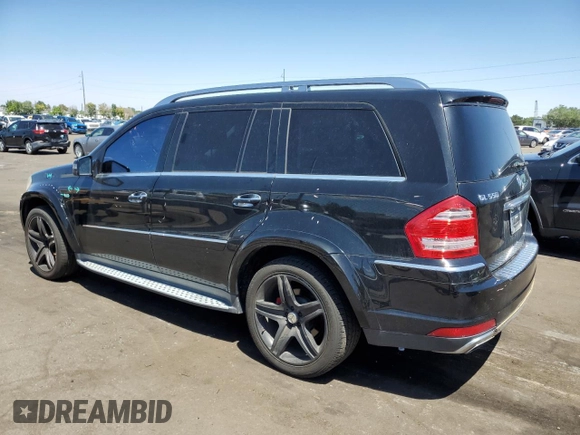 2010 Mercedes-Benz GL-Class GL 550 with VIN 4JGBF8GE1AA561709, listed as a Copart auction lot 65414554 with 156,777 mi miles and Salvage Title. Bid and sale history available at carsss.com. Image 2.