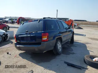 2000 Jeep Grand Cherokee Laredo with VIN 1J4G248S5YC413977, listed as a IAAI auction lot 42045808 with Not provided miles and . Bid and sale history available at DreamBid. Image 4.