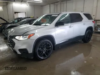 2020 Chevrolet Traverse LS with VIN 1GNERFKW1LJ130830, listed as a Copart auction lot 61297324 with 97,301 mi miles and Salvage Title. Bid and sale history available at carsss.com. Image 1.