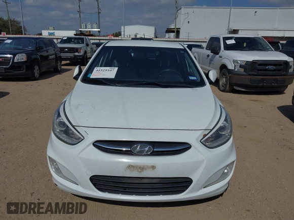 2015 Hyundai Accent Sport with VIN KMHCU5AE5FU201477, listed as a IAAI auction lot 41529347 with 189,774 mi miles. Bid and sale history available at carsss.com. Image 6.