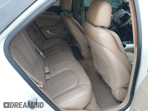 2010 Cadillac CTS with VIN 1G6DE8EG4A0146249, listed as a IAAI auction lot 41338054 with 190,003 mi miles and . Bid and sale history available at DreamBid. Image 8.