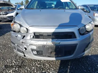 2012 Chevrolet Sonic LT with VIN 1G1JC5SH0C4178833, listed as a IAAI auction lot 41400504 with 163,356 mi miles and . Bid and sale history available at DreamBid. Image 6.