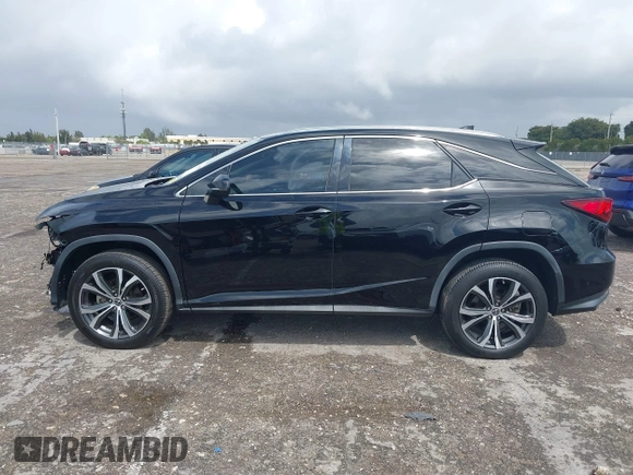 2020 Lexus RX 350 with VIN 2T2HZMAA9LC153571, listed as a IAAI auction lot 41710981 with 34,354 mi miles and . Bid and sale history available at DreamBid. Image 14.