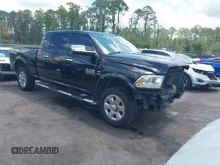 2016 Ram 2500 Laramie with VIN 3C6UR5NL3GG197024, listed as a IAAI auction lot 42527161 with 147,290 mi miles and . Bid and sale history available at DreamBid. Image 1.