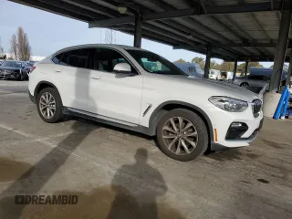 2019 BMW X4 xDrive30i with VIN 5UXUJ3C52KLG53648, listed as a Copart auction lot 48374685 with 73,708 mi miles and Salvage Title. Bid and sale history available at carsss.com. Image 4.