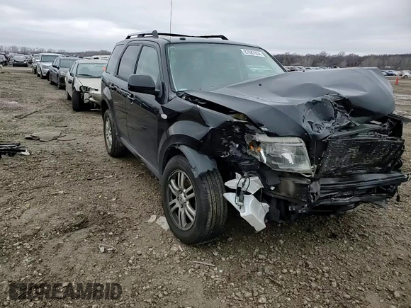2009 Mercury Mariner Premier z VIN 4M2CU87G89KJ09224, wystawiony jako Copart lot #87087034 z przebiegiem Nie podano mil oraz Szkoda całkowita • Salvage title. Historia ofert i sprzedaży dostępna na DreamBid. Obrazek 11.