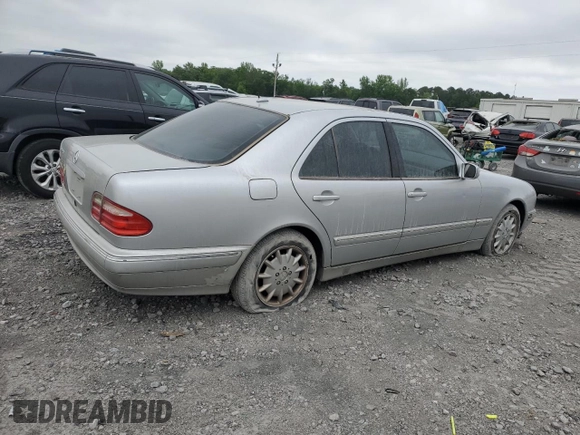 2000 Mercedes-Benz E 320 with VIN WDBJF65J1YB099417, listed as a Copart auction lot 54656915 with 130,387 mi miles and Salvage Title. Bid and sale history available at DreamBid. Image 3.
