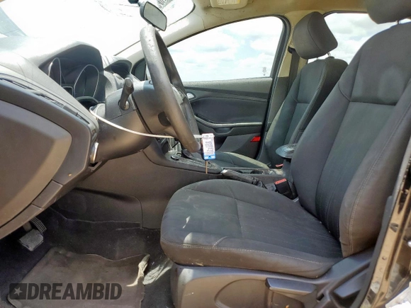 2016 Ford Focus SE with VIN 1FADP3F23GL271205, listed as a Copart auction lot 59395855 with 202,504 mi miles and Salvage title. Bid and sale history available at DreamBid. Image 7.