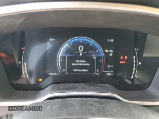 2023 Toyota Corolla Cross XLE with VIN 7MUDAAAG2PV042957, listed as a Copart auction lot 60301555 with 39,211 mi miles and Salvage title. Bid and sale history available at DreamBid. Image 9.