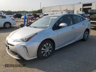 2021 Toyota Prius LE z VIN JTDL9MFU8M3030193, wystawiony jako Copart lot #59482995 z przebiegiem 48 202 mil mil oraz Szkoda całkowita • Salvage title. Historia ofert i sprzedaży dostępna na DreamBid. Obrazek 1.