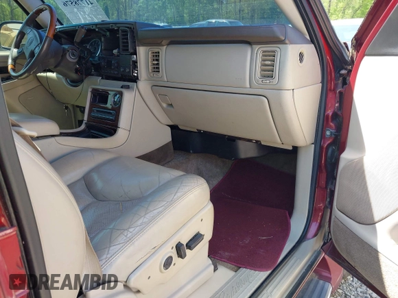 2003 Cadillac Escalade z VIN 1GYEC63T63R132602, wystawiony jako IAAI lot #41778576 z przebiegiem 242 443 mil mil oraz . Historia ofert i sprzedaży dostępna na DreamBid. Obrazek 5.