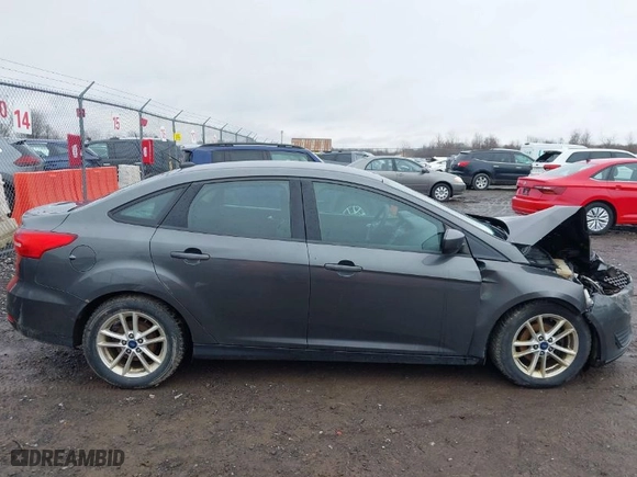 2018 Ford Focus SE with VIN 1FADP3F23JL298265, listed as a IAAI auction lot 42005754 with 134,721 mi miles. Bid and sale history available at carsss.com. Image 14.