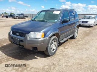 2004 Ford Escape XLT z VIN 1FMYU03144KA97818, wystawiony jako IAAI lot #42213241 z przebiegiem 183 280 mil mil oraz . Historia ofert i sprzedaży dostępna na DreamBid. Obrazek 2.