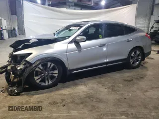 2014 Honda Crosstour EX-L z VIN 5J6TF2H57EL002352, wystawiony jako Copart lot #51279705 z przebiegiem 176 980 mil mil oraz Czysty tytuł • Clean title. Historia ofert i sprzedaży dostępna na DreamBid. Obrazek 1.