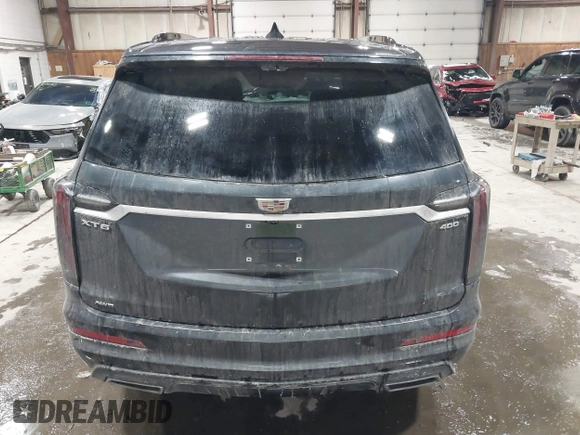 2022 Cadillac XT6 Sport with VIN 1GYKPGRS2NZ164879, listed as a IAAI auction lot 41555242 with 10,862 mi miles. Bid and sale history available at carsss.com. Image 16.