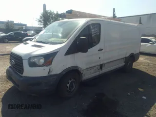2016 Ford Transit Cargo z VIN 1FTYE1YMXGKA16724, wystawiony jako IAAI lot #40341511 z przebiegiem 188 118 mil mil oraz . Historia ofert i sprzedaży dostępna na DreamBid. Obrazek 2.