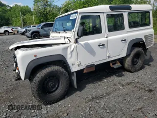 1996 Land Rover Defender with VIN SALLDHM68TA991998, listed as a Copart auction lot 57596025 with 150,656 mi miles and Salvage title. Bid and sale history available at DreamBid. Image 1.