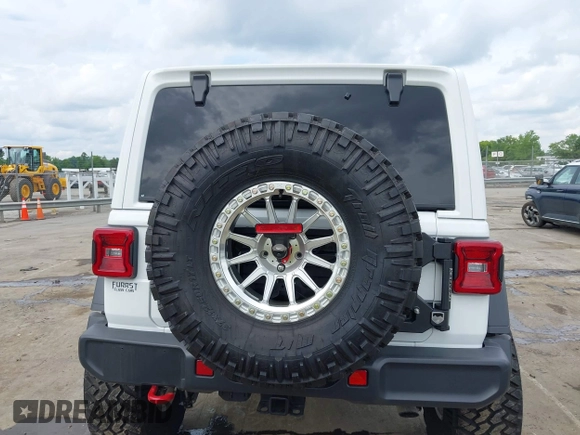 2021 Jeep Wrangler Unlimited Rubicon with VIN 1C4HJXFG7MW527498, listed as a IAAI auction lot 42393520 with 18,085 mi miles and . Bid and sale history available at DreamBid. Image 16.