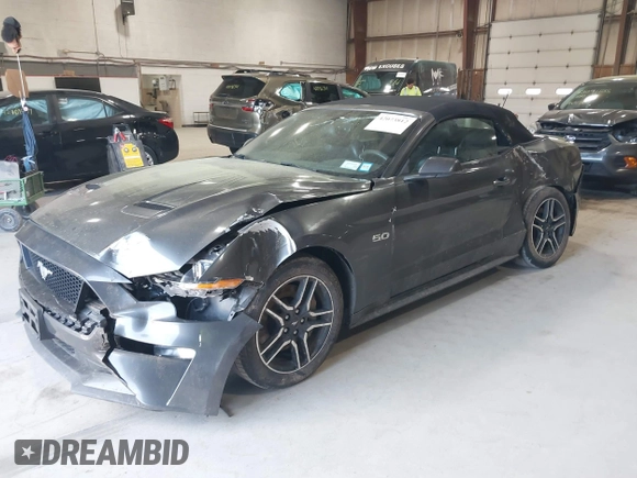 2019 Ford Mustang GT Premium with VIN 1FATP8FF4K5171686, listed as a IAAI auction lot 42073812 with 128,768 mi miles. Bid and sale history available at carsss.com. Image 2.
