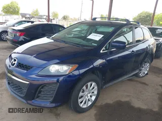 2010 Mazda CX-7 Sport with VIN JM3ER2WM1A0335634, listed as a IAAI auction lot 41846514 with 228,770 mi miles and . Bid and sale history available at DreamBid. Image 2.