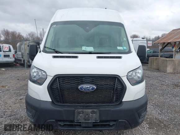 2023 Ford Transit Cargo with VIN 1FTBR3U89PKA07396, listed as a IAAI auction lot 41878907 with 103,402 mi miles and . Bid and sale history available at DreamBid. Image 6.