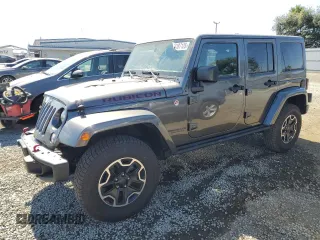 2016 Jeep Wrangler Unlimited Rubicon z VIN 1C4HJWFG3GL273501, wystawiony jako Copart lot #64187125 z przebiegiem 88 123 mil mil oraz Szkoda całkowita • Salvage title. Historia ofert i sprzedaży dostępna na DreamBid. Obrazek 1.