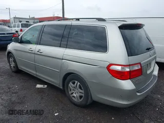 2007 Honda Odyssey EX-L with VIN 5FNRL38787B455417, listed as a IAAI auction lot 42104303 with 214,482 mi miles and . Bid and sale history available at DreamBid. Image 3.