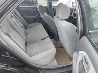 2001 Toyota Camry CE z VIN 4T1BG22K81U054795, wystawiony jako IAAI lot #42359932 z przebiegiem 167 341 mil mil oraz . Historia ofert i sprzedaży dostępna na DreamBid. Obrazek 8.