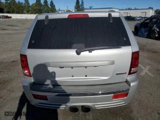 2007 Jeep Grand Cherokee SRT-8 with VIN 1J8HR78327C662597, listed as a Copart auction lot 85585864 with 184,430 mi miles and Salvage Title. Bid and sale history available at carsss.com. Image 6.