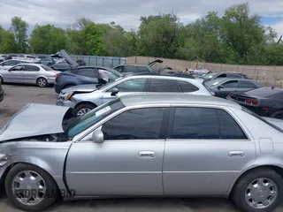 2002 Cadillac DeVille z VIN 1G6KD54Y22U108080, wystawiony jako IAAI lot #42304179 z przebiegiem 278 141 mil mil oraz . Historia ofert i sprzedaży dostępna na DreamBid. Obrazek 14.