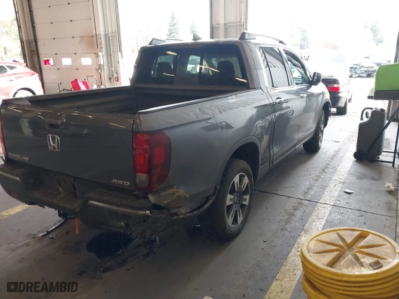 2017 Honda Ridgeline RTL-E with VIN 5FPYK3F73HB034764, listed as a IAAI auction lot 41146866 with 125,885 mi miles. Bid and sale history available at carsss.com. Image 4.